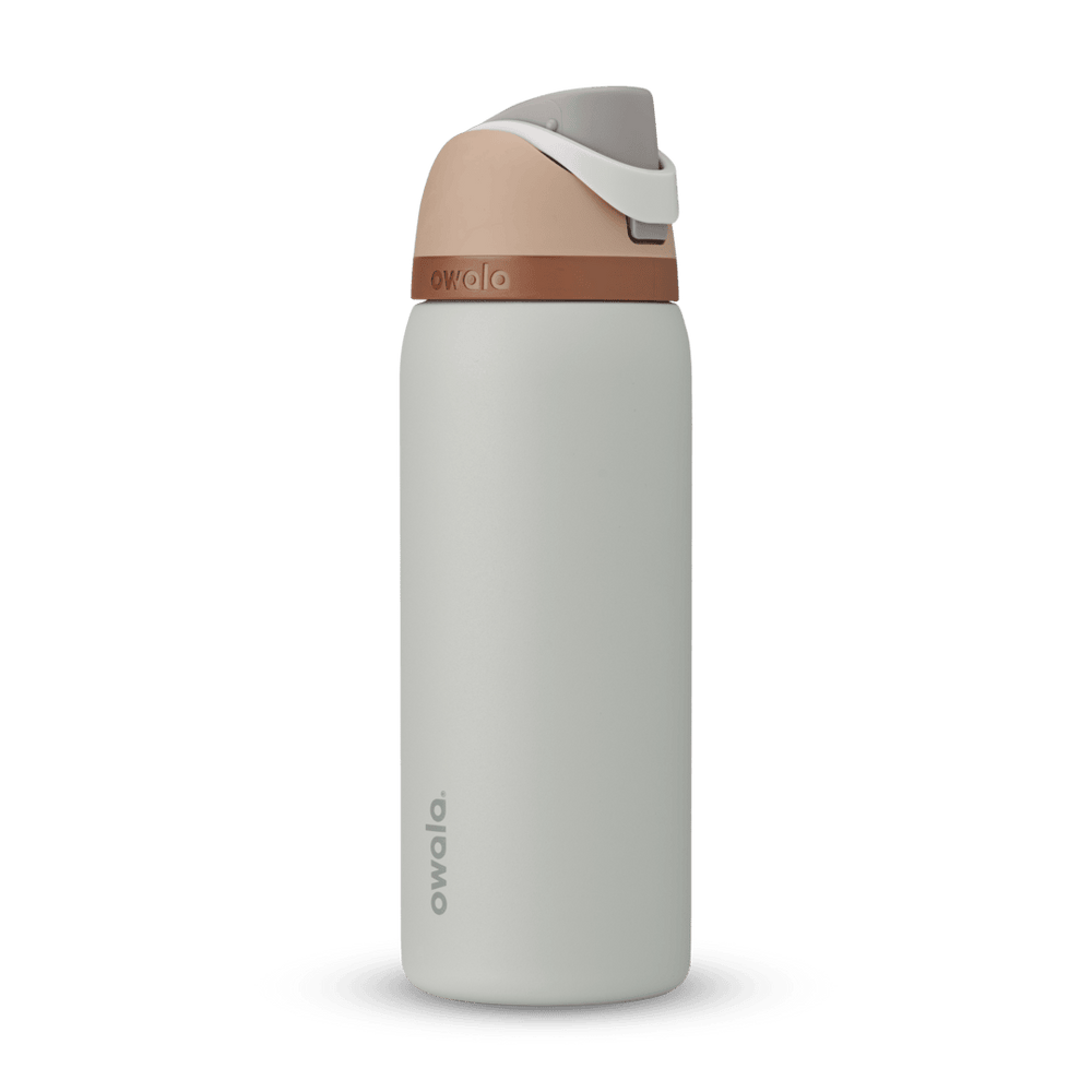 Full profile shot of the 32oz 'Calm Waters' FreeSip water bottle, highlighting its soothing blue-grey and tan color design.