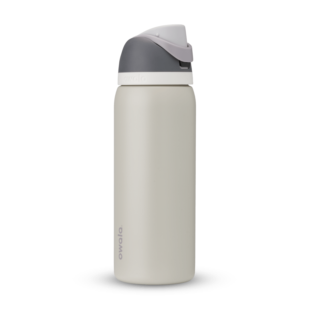 Full profile shot of the 32oz 'Rock On' FreeSip water bottle in grey and silt.